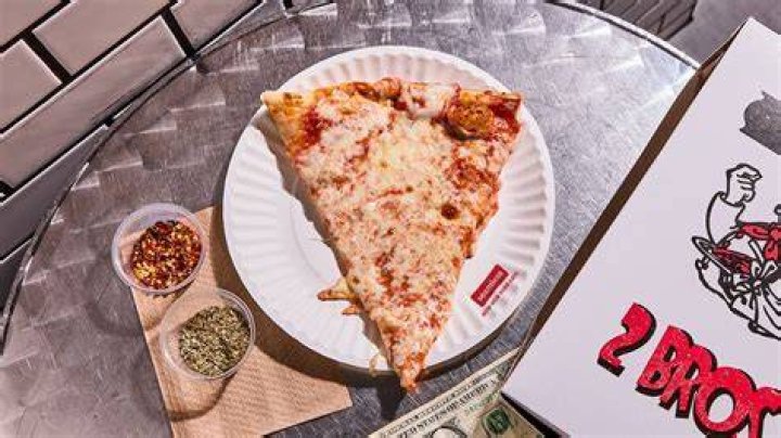 $1 pizza slices at NYC's 2 Bros. Pizza are toast