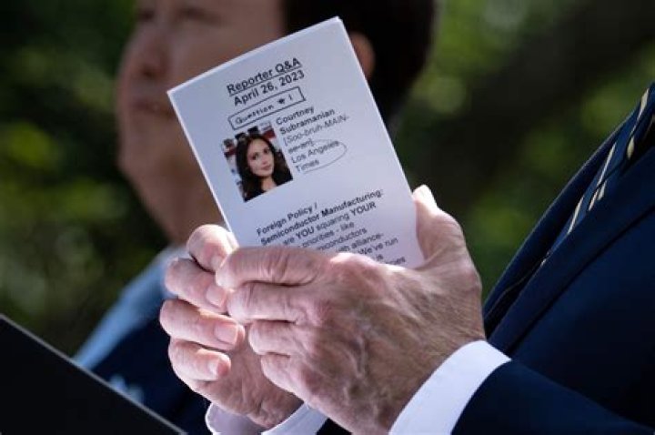 Biden spotted with cheat cards with names, photos of Irish leaders
