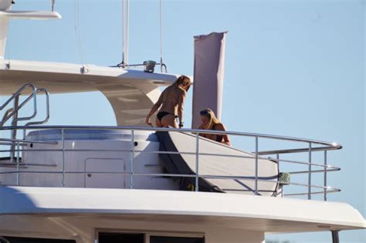 Bikini babes soak up the sun on Scott Burke's porn party yacht