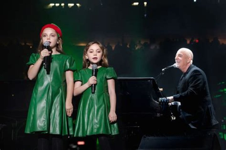 Billy Joel performs with young daughters at Madison Square Garden