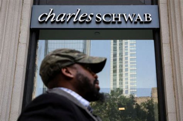Charles Schwab plans to cut jobs, close offices as downturn hits Wall Street