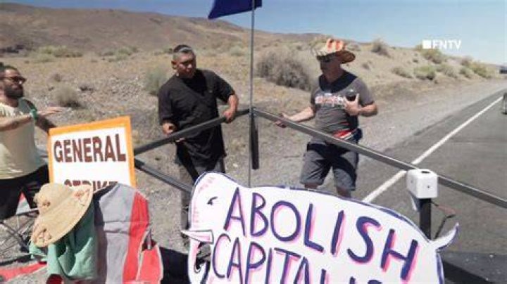 Climate activists block traffic into Burning Man