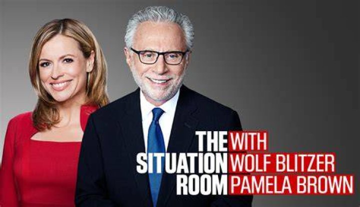CNN cuts to commercial as Wolf Blitzer looks like he's about to vomit