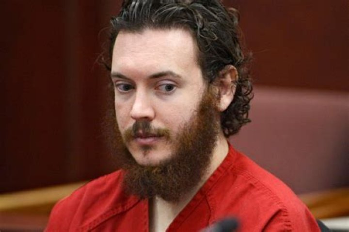 Colorado theater shooter tethered to floor at trial
