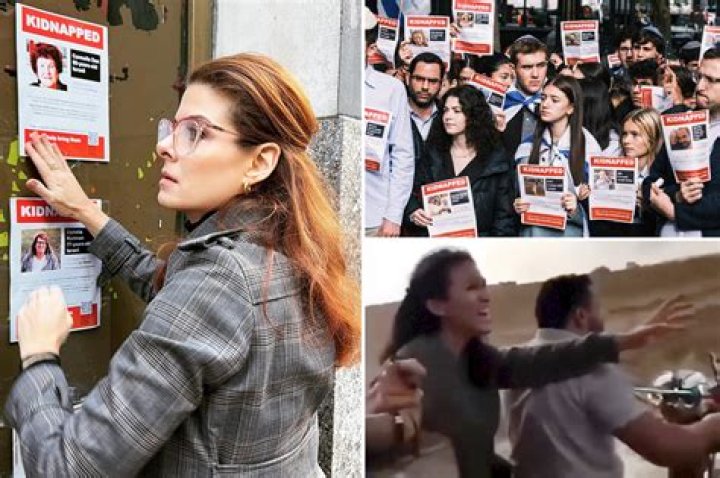 Debra Messing hangs up posters for Israeli hostages in NYC