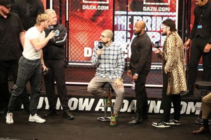 Dillon Danis blasts Logan Paul with mic in wild press conference brawl