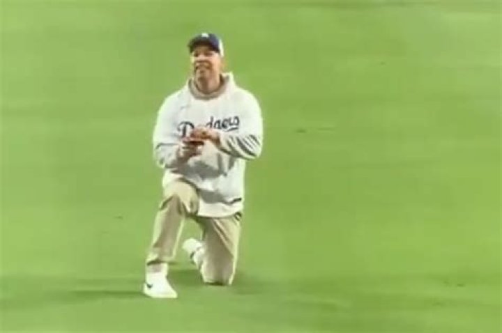 Dodgers fan tackled by security in on-field proposal gone wrong