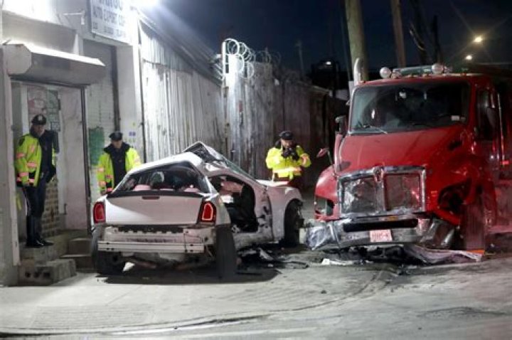 Driver crashes into parked truck in the Bronx, killing 2 passengers