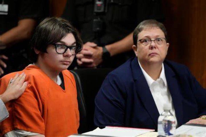 Ethan Crumbley's mom blames husband for helping son buy gun, prosecutors say