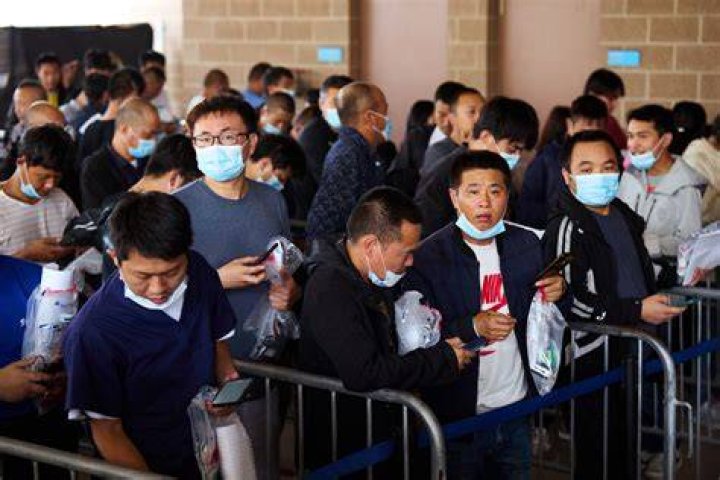 Experts warn of national security risks after CBP slashes question list for Chinese migrants from 40 to just 5