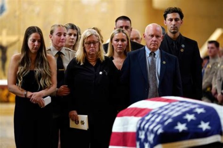 Family of Los Angeles deputy Ryan Clinkunbroomer killed in ambush shooting plans to sue county