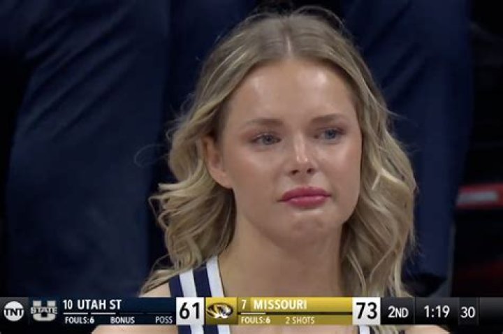 Fans rip TNT over crying Utah State cheerleader