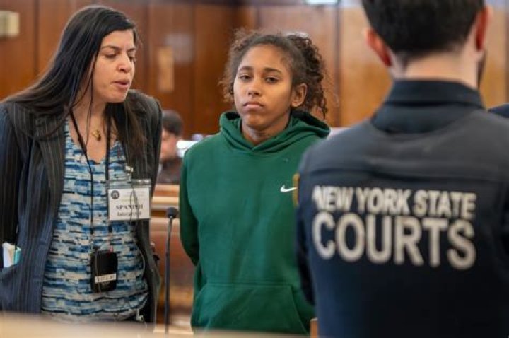 Grinning woman Edgarlis Vegas arrested in Times Square cop beatdown