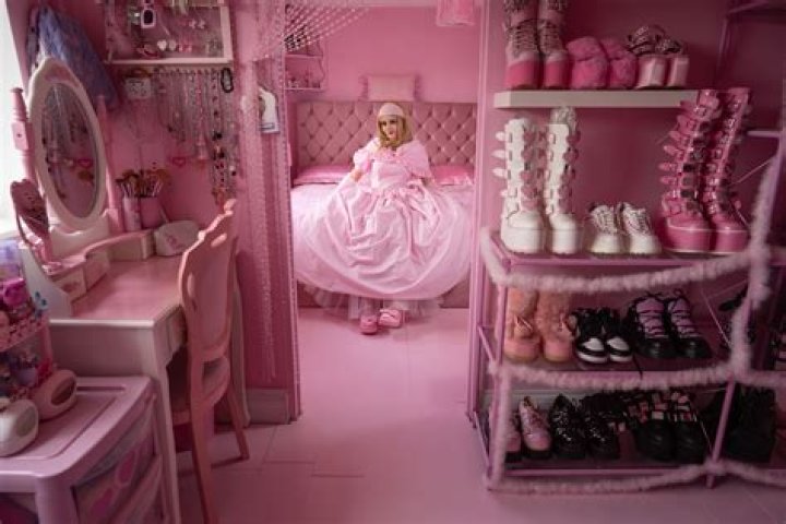 I have 100 Barbie dolls and only dress in pink — I worry it turns off men