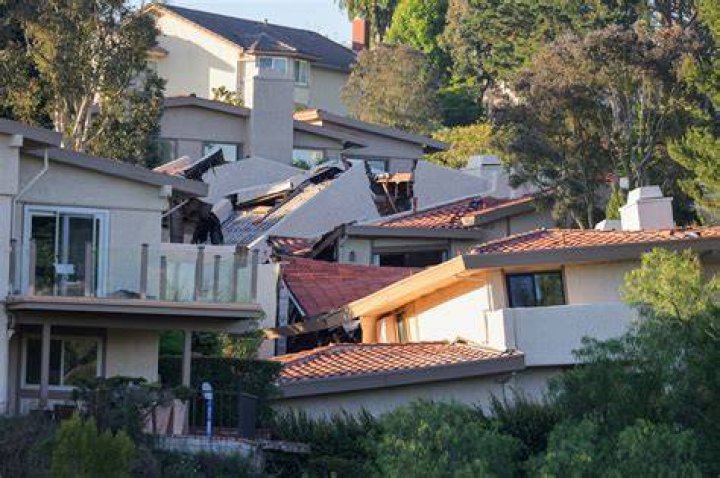 Landslide forces evacuation of 12 homes south of Los Angeles