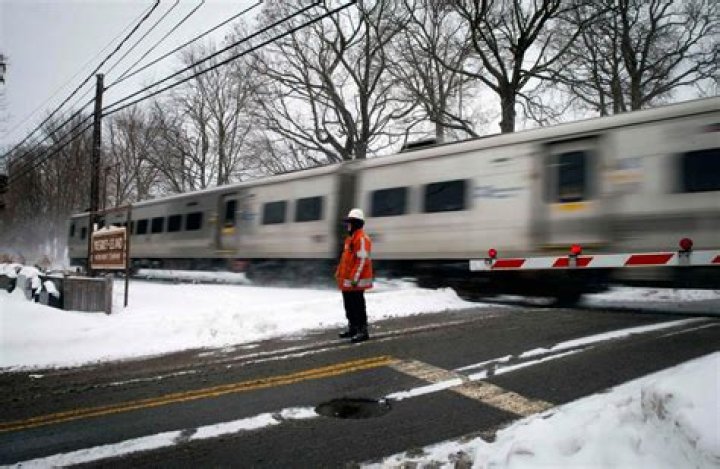 Metro-North train narrowly misses car stuck on tracks