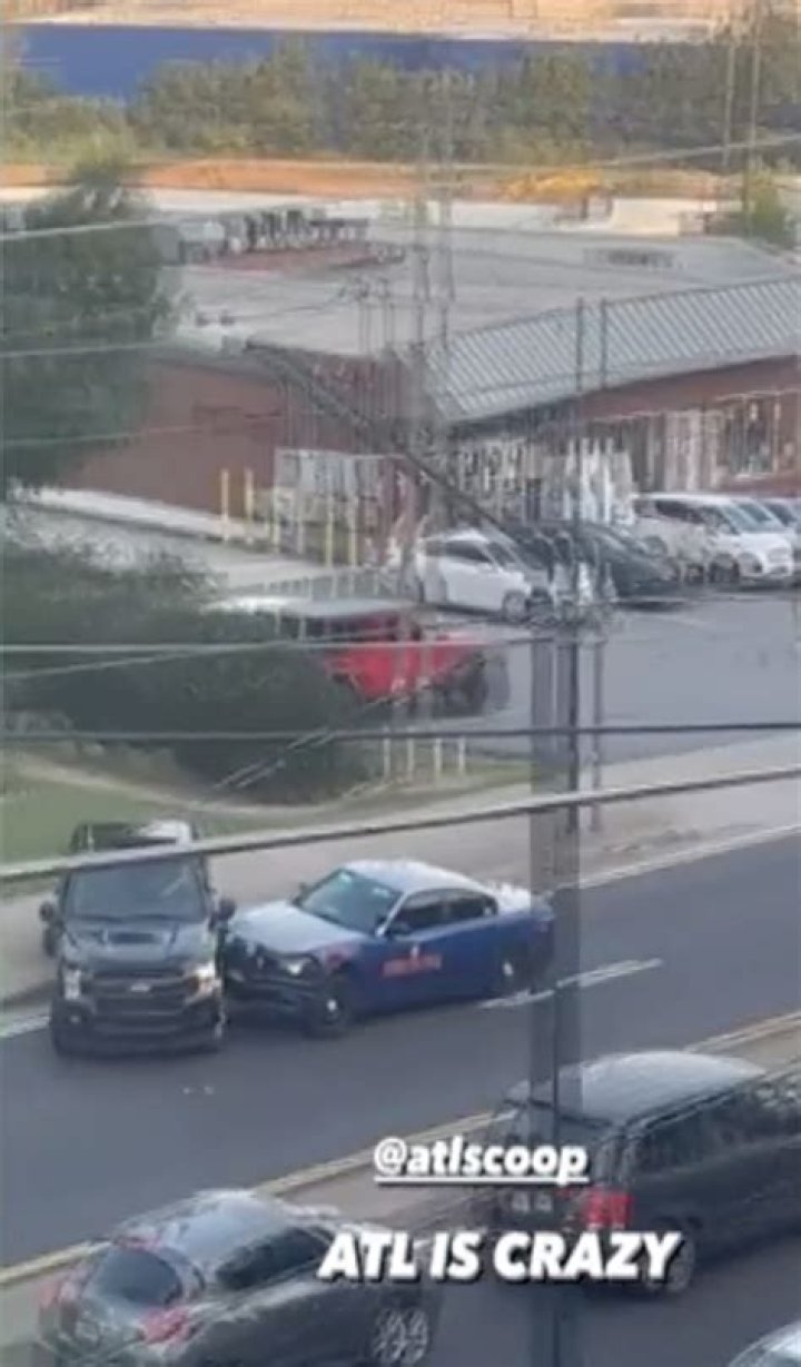 Moment trucker hits people while fleeing cops in busy Atlanta intersection