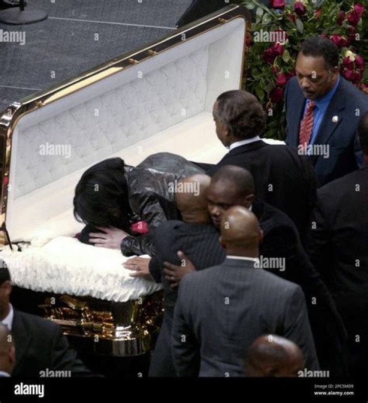 NJ model struts runway at open casket funeral, defends tribute