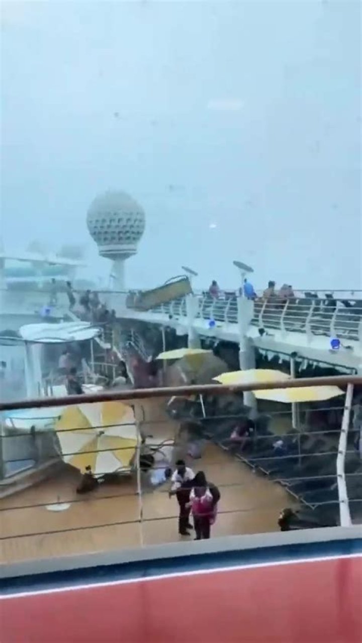 Royal Caribbean cruise ship passengers flee during violent storm