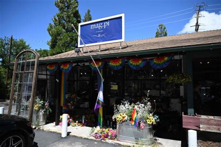 Slain store owner Lauri Carleton had ordered larger Pride flag