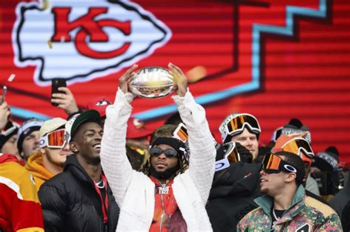 Travis Kelce wobbles on stage at Chiefs' boozy Super Bowl parade