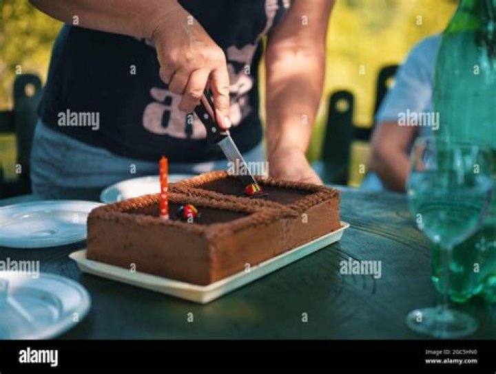 Video shows man using gun to cut birthday cake