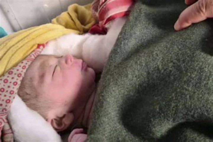 Video shows rescue of abandoned newborn from shallow grave